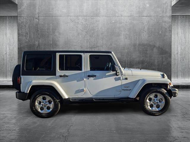 used 2015 Jeep Wrangler Unlimited car, priced at $19,138