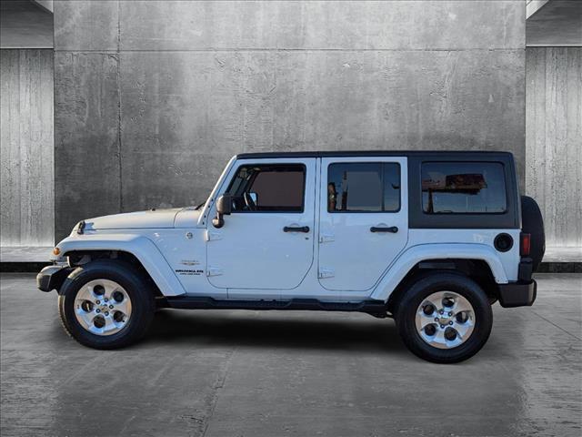 used 2015 Jeep Wrangler Unlimited car, priced at $19,138