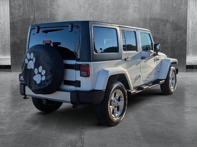 used 2015 Jeep Wrangler Unlimited car, priced at $19,138