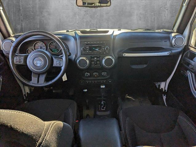 used 2015 Jeep Wrangler Unlimited car, priced at $19,138