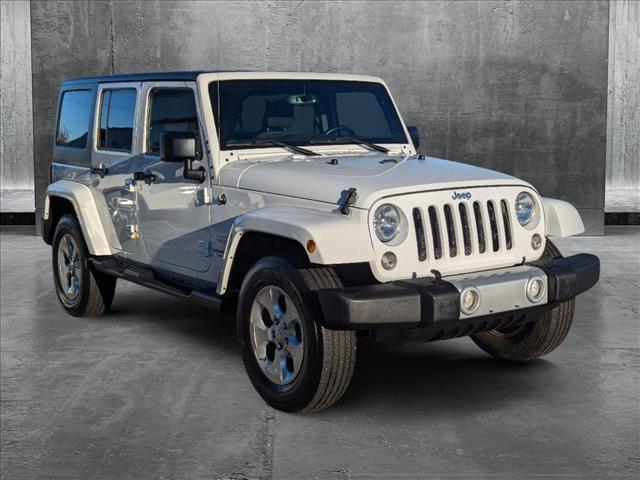 used 2015 Jeep Wrangler Unlimited car, priced at $19,138