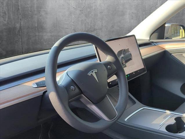 used 2024 Tesla Model Y car, priced at $32,532