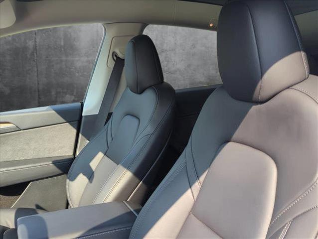 used 2024 Tesla Model Y car, priced at $32,532