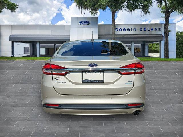 used 2018 Ford Fusion car, priced at $12,140