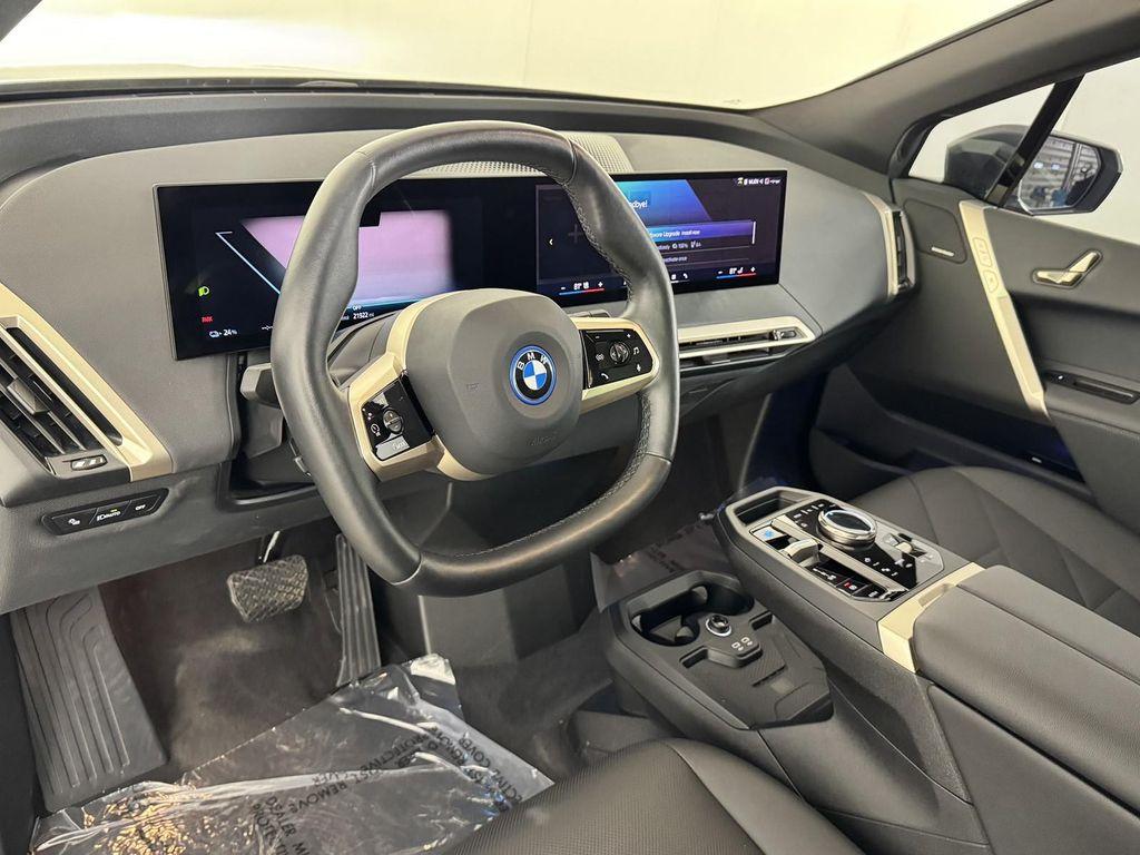 used 2025 BMW iX car, priced at $54,998