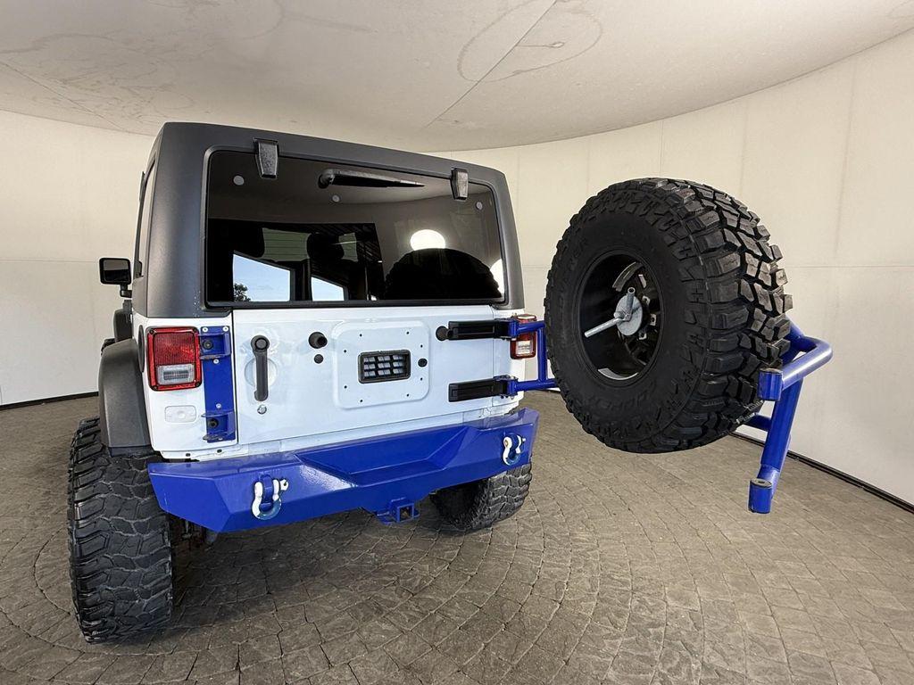 used 2014 Jeep Wrangler Unlimited car, priced at $14,998