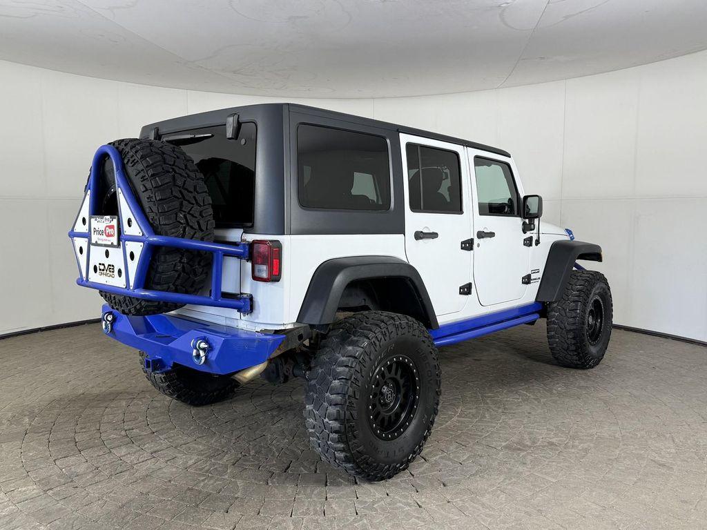 used 2014 Jeep Wrangler Unlimited car, priced at $14,998