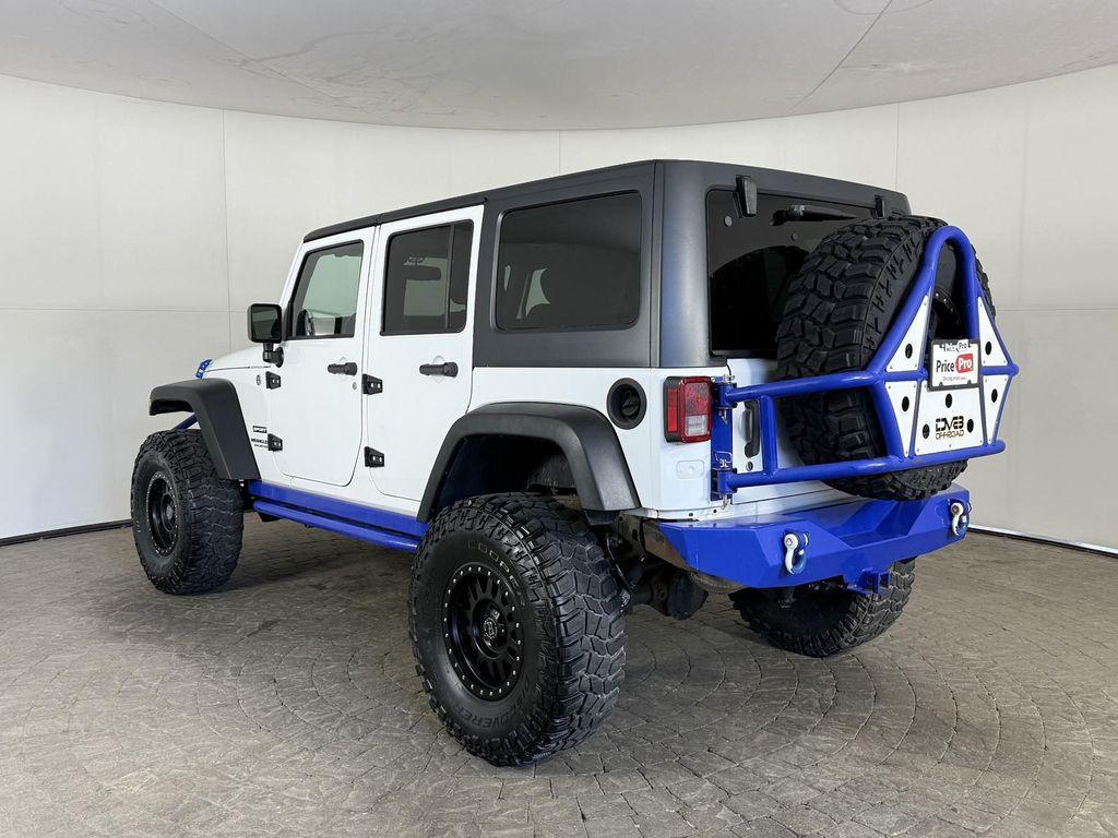 used 2014 Jeep Wrangler Unlimited car, priced at $14,998