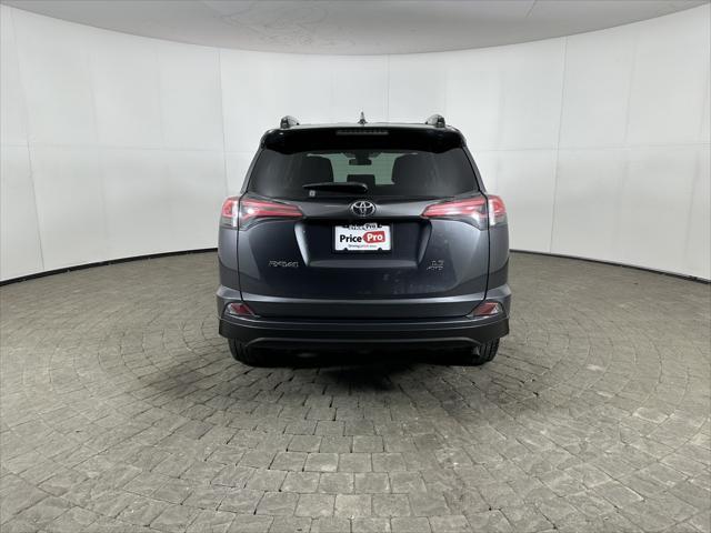 used 2018 Toyota RAV4 car, priced at $14,998