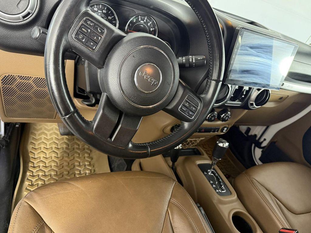 used 2013 Jeep Wrangler Unlimited car, priced at $19,998