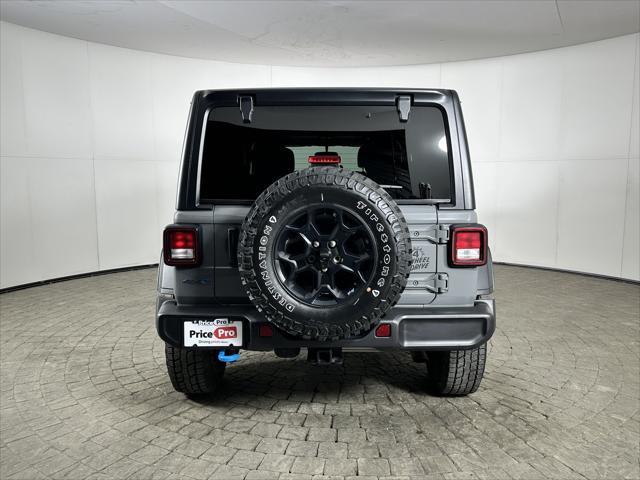 used 2023 Jeep Wrangler 4xe car, priced at $26,998