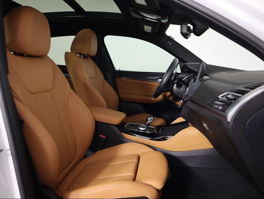 used 2025 BMW X4 car, priced at $52,500