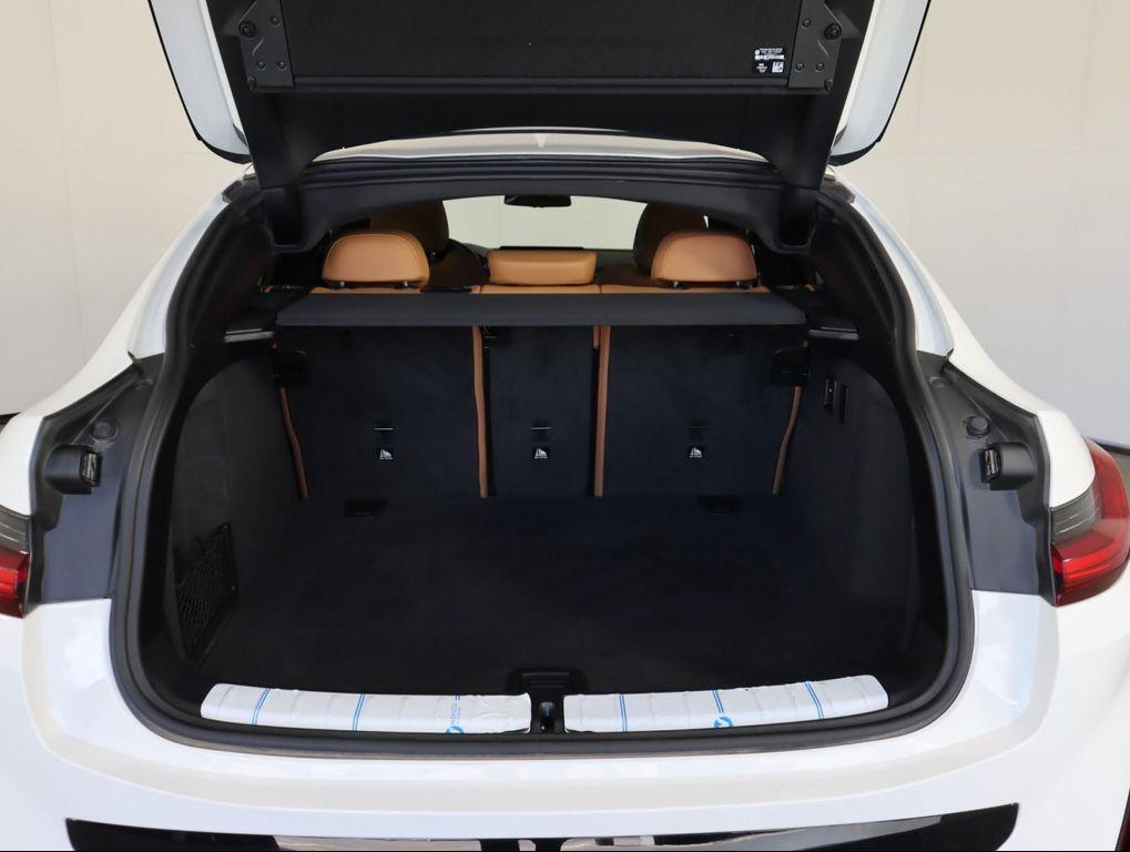 used 2025 BMW X4 car, priced at $52,500