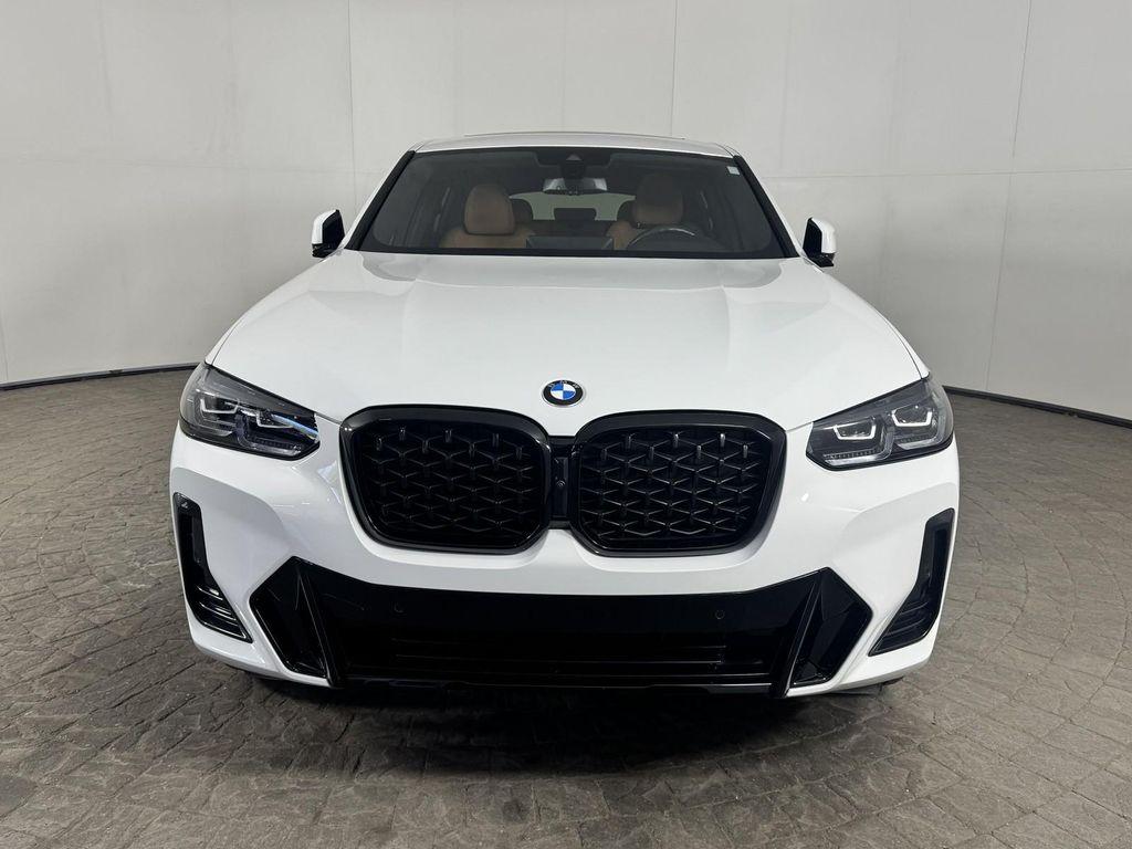 used 2025 BMW X4 car, priced at $52,500