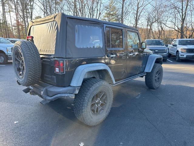 used 2013 Jeep Wrangler Unlimited car, priced at $16,985