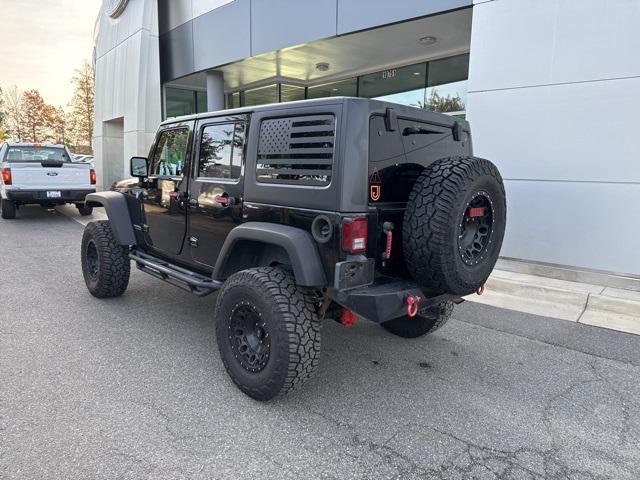 used 2014 Jeep Wrangler Unlimited car, priced at $18,999