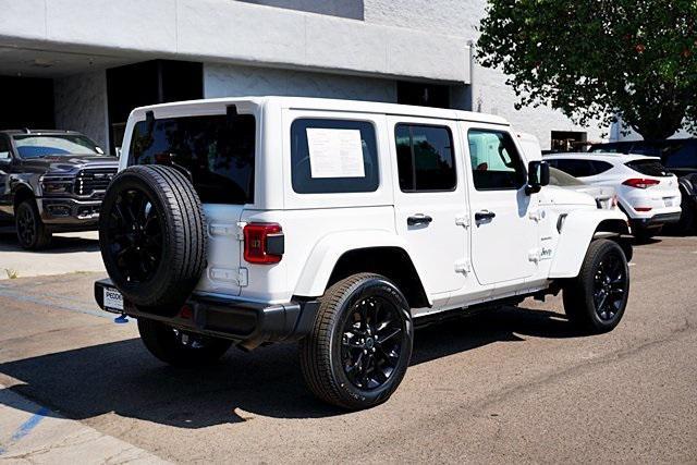 used 2024 Jeep Wrangler 4xe car, priced at $32,496