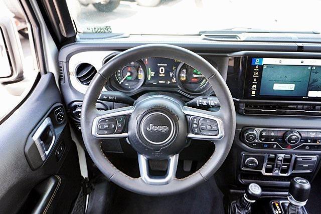 used 2024 Jeep Wrangler 4xe car, priced at $32,496