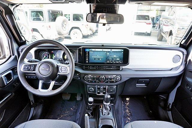 used 2024 Jeep Wrangler 4xe car, priced at $33,274