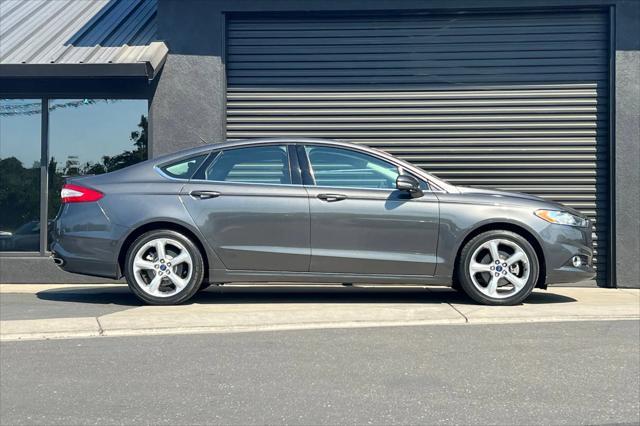 used 2015 Ford Fusion car, priced at $9,989