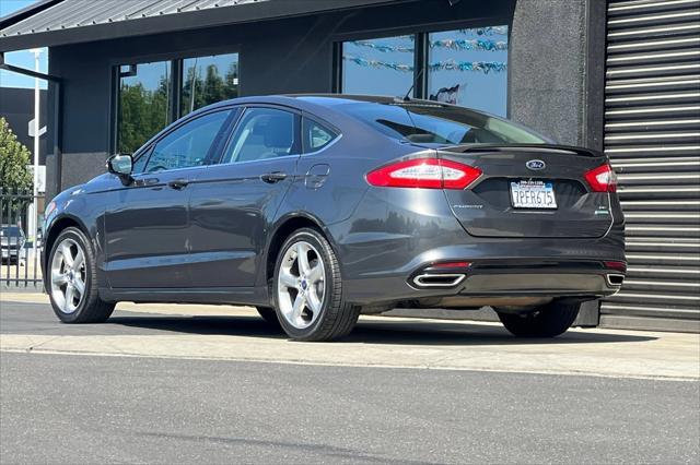 used 2015 Ford Fusion car, priced at $9,989