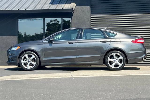 used 2015 Ford Fusion car, priced at $9,989