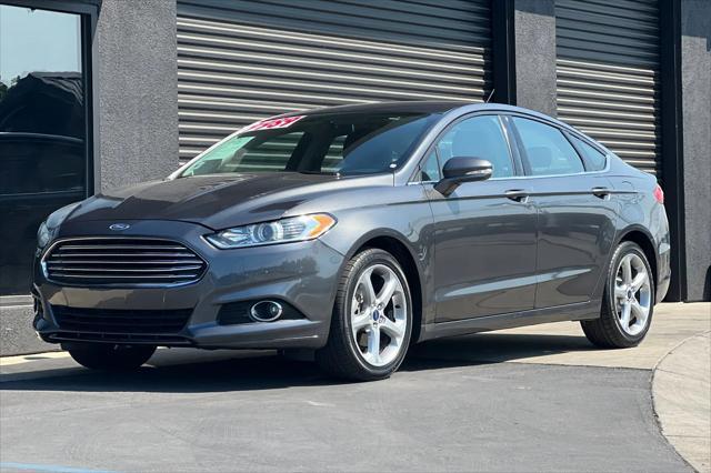 used 2015 Ford Fusion car, priced at $9,989