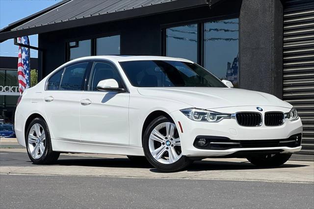 used 2018 BMW 330 car, priced at $17,199