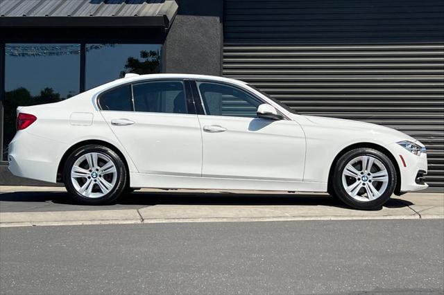 used 2018 BMW 330 car, priced at $17,199