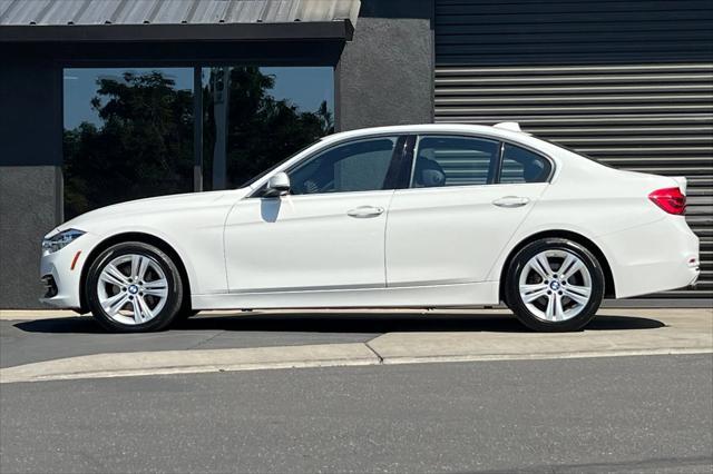 used 2018 BMW 330 car, priced at $17,199