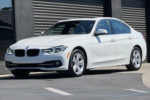 used 2018 BMW 330 car, priced at $17,199