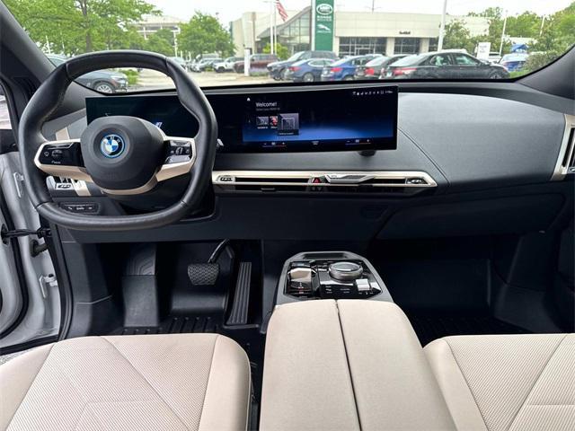 used 2023 BMW iX car, priced at $49,990