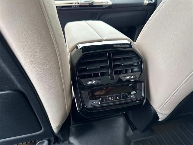 used 2023 BMW iX car, priced at $49,990