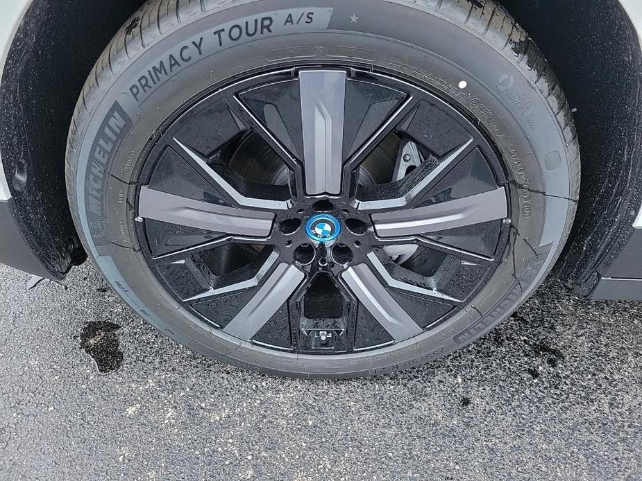 new 2024 BMW iX car, priced at $89,545