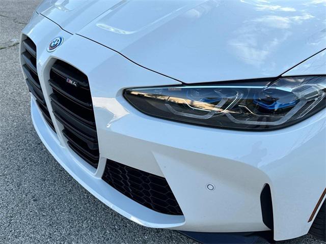 used 2023 BMW M4 car, priced at $59,990