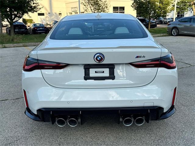 used 2023 BMW M4 car, priced at $59,990