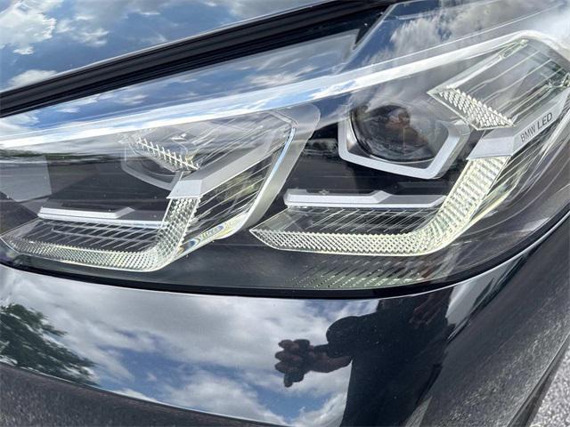 used 2022 BMW X4 car, priced at $39,990