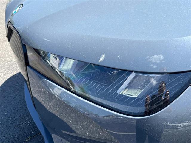 new 2026 BMW iX car, priced at $87,945