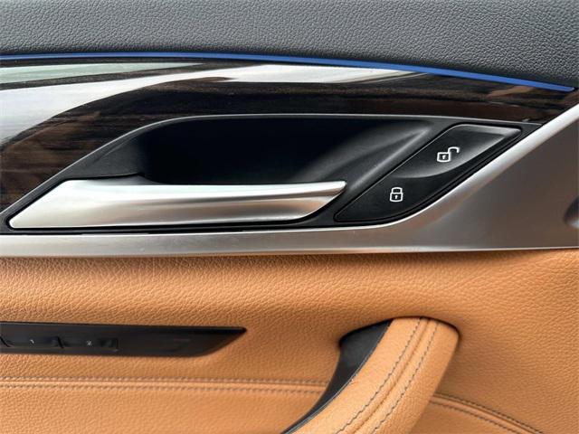 used 2023 BMW 530e car, priced at $39,990