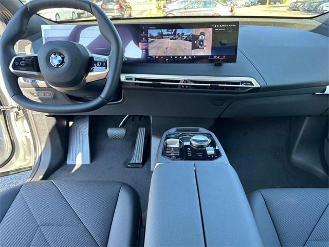 new 2026 BMW iX car, priced at $85,045