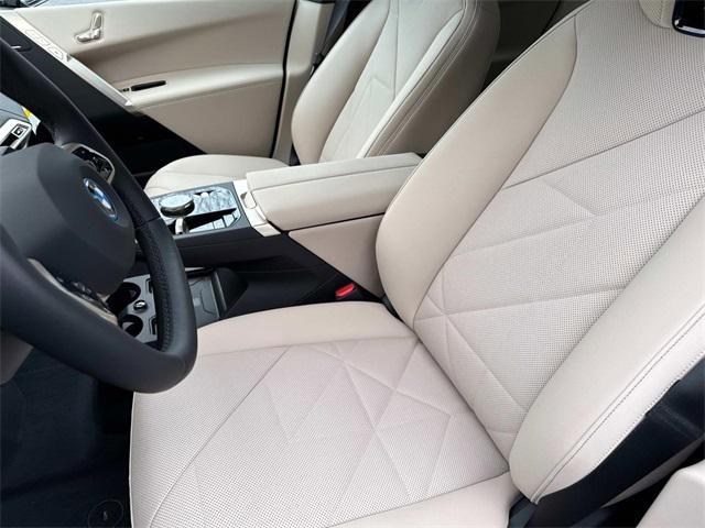 new 2025 BMW iX car, priced at $97,275