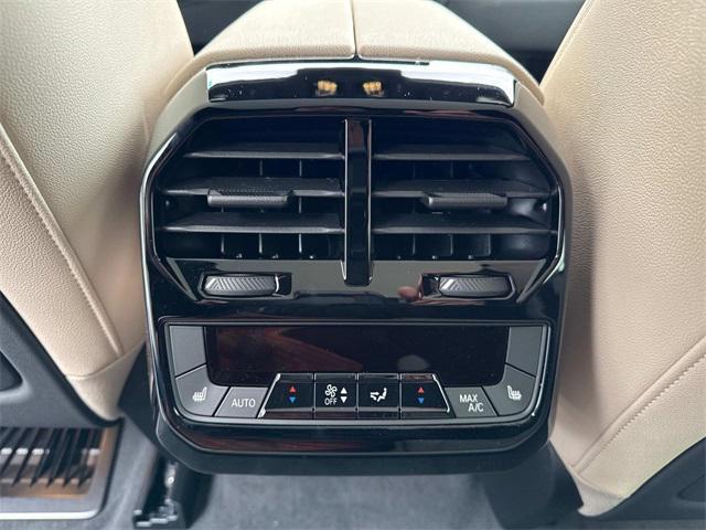new 2025 BMW iX car, priced at $97,275
