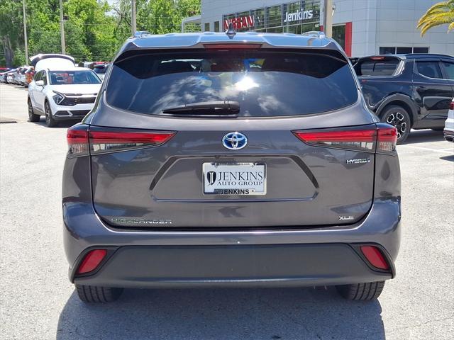 used 2021 Toyota Highlander Hybrid car, priced at $29,699