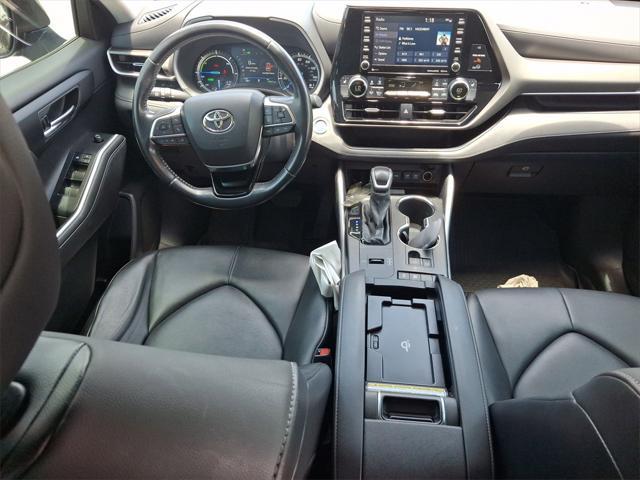 used 2021 Toyota Highlander Hybrid car, priced at $29,699