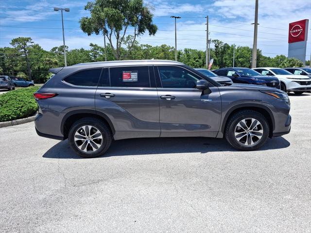 used 2021 Toyota Highlander Hybrid car, priced at $29,699