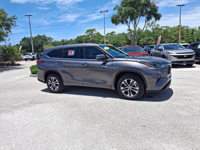 used 2021 Toyota Highlander Hybrid car, priced at $29,699