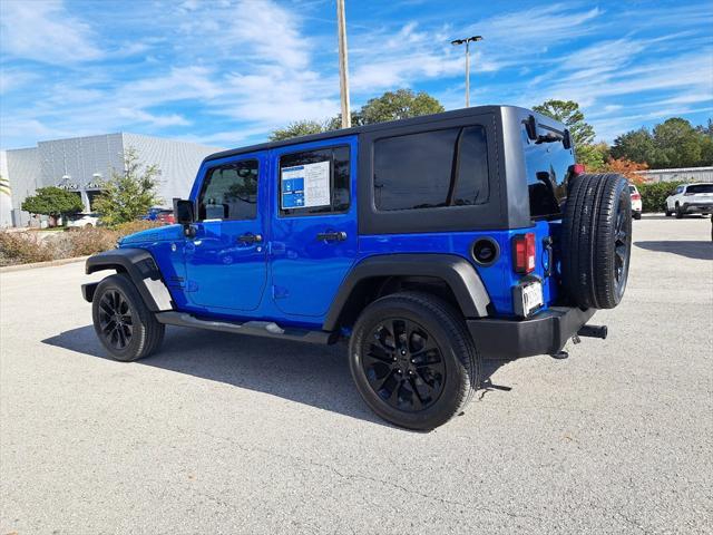 used 2011 Jeep Wrangler Unlimited car, priced at $13,994