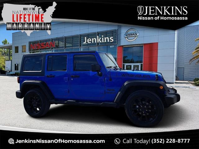 used 2011 Jeep Wrangler Unlimited car, priced at $13,994