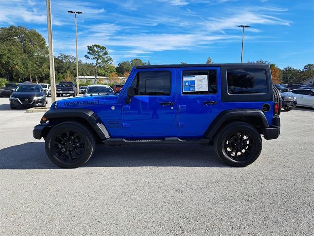 used 2011 Jeep Wrangler Unlimited car, priced at $13,994