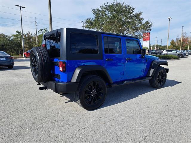 used 2011 Jeep Wrangler Unlimited car, priced at $13,994